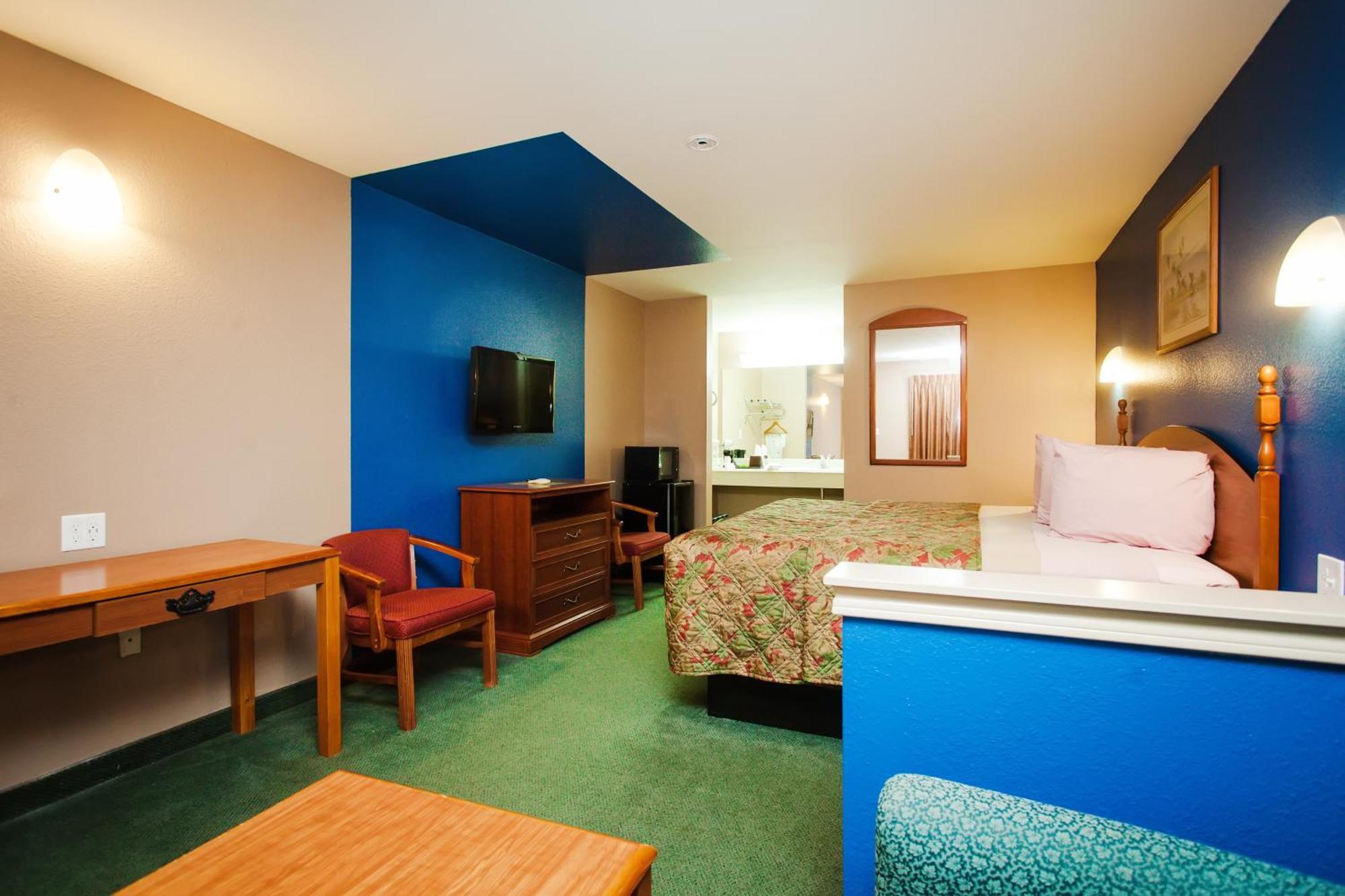 Scottish Inn & Suites Hankamer Habitación foto