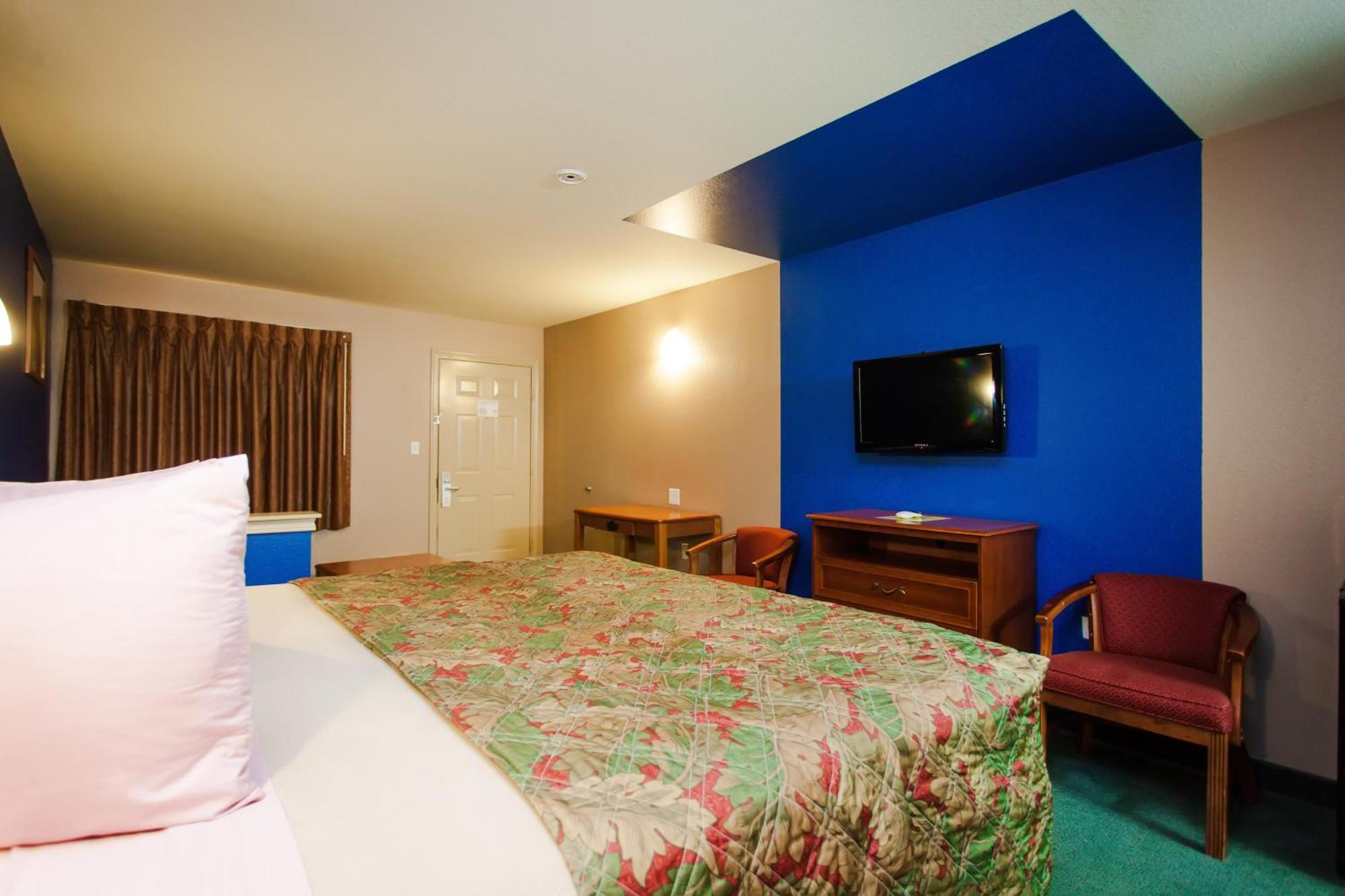 Scottish Inn & Suites Hankamer Habitación foto