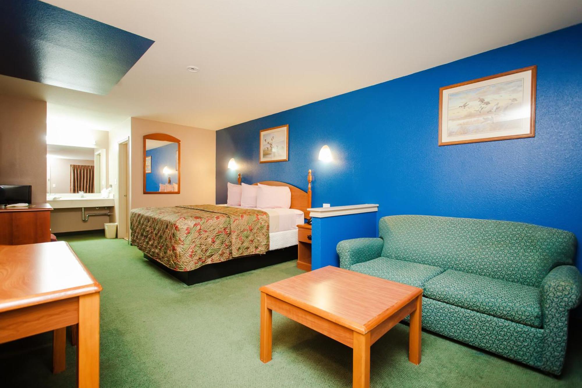 Scottish Inn & Suites Hankamer Habitación foto