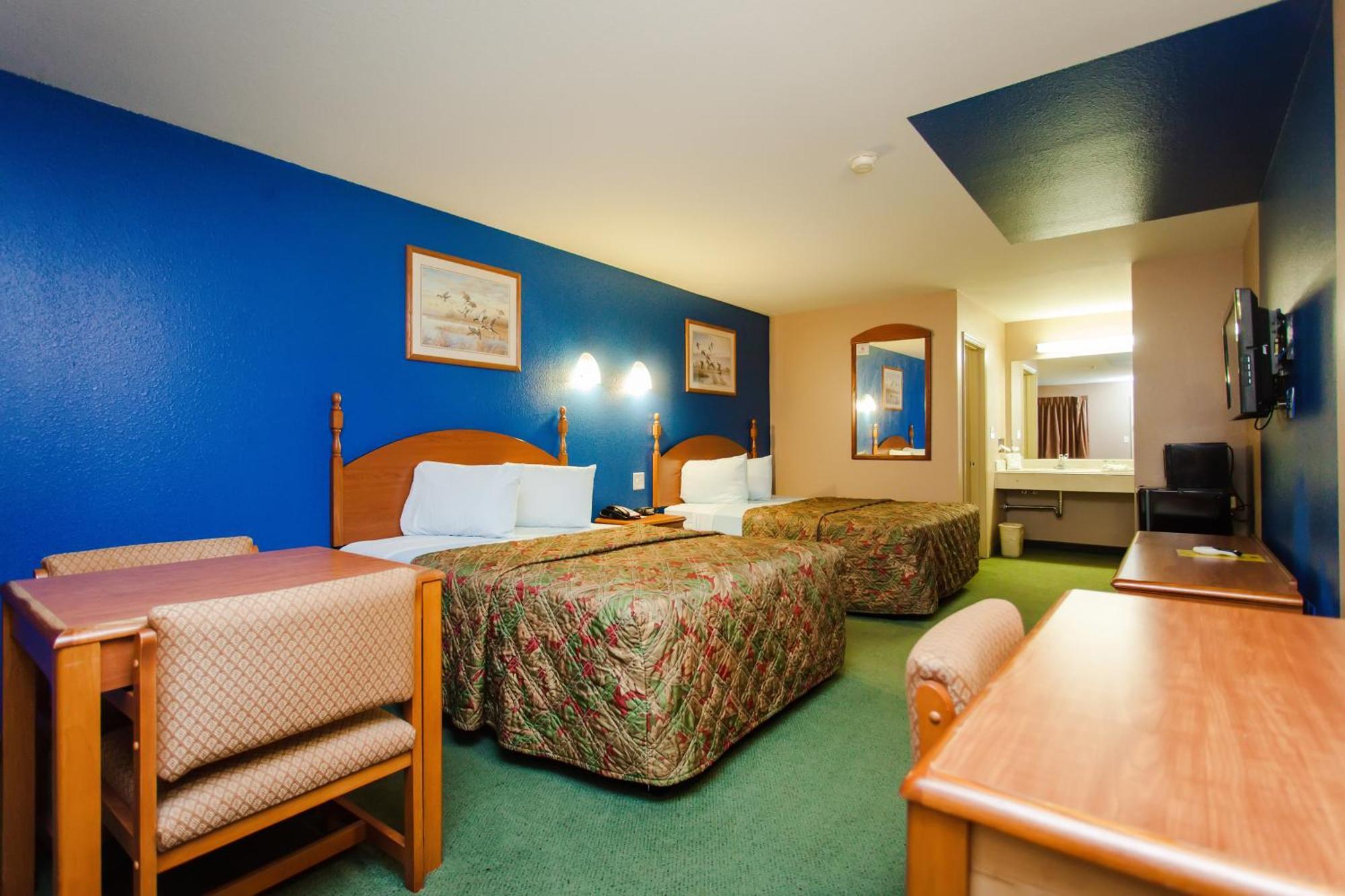 Scottish Inn & Suites Hankamer Habitación foto